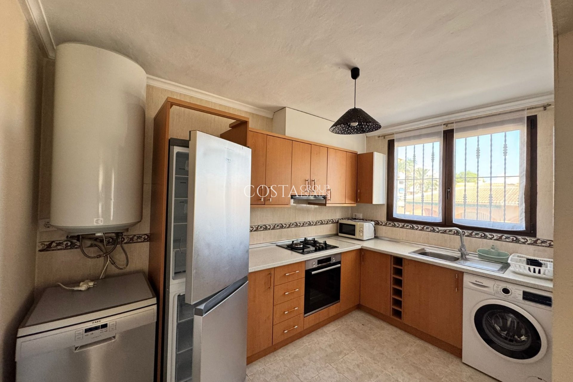 Revente - Maison -
Punta Prima